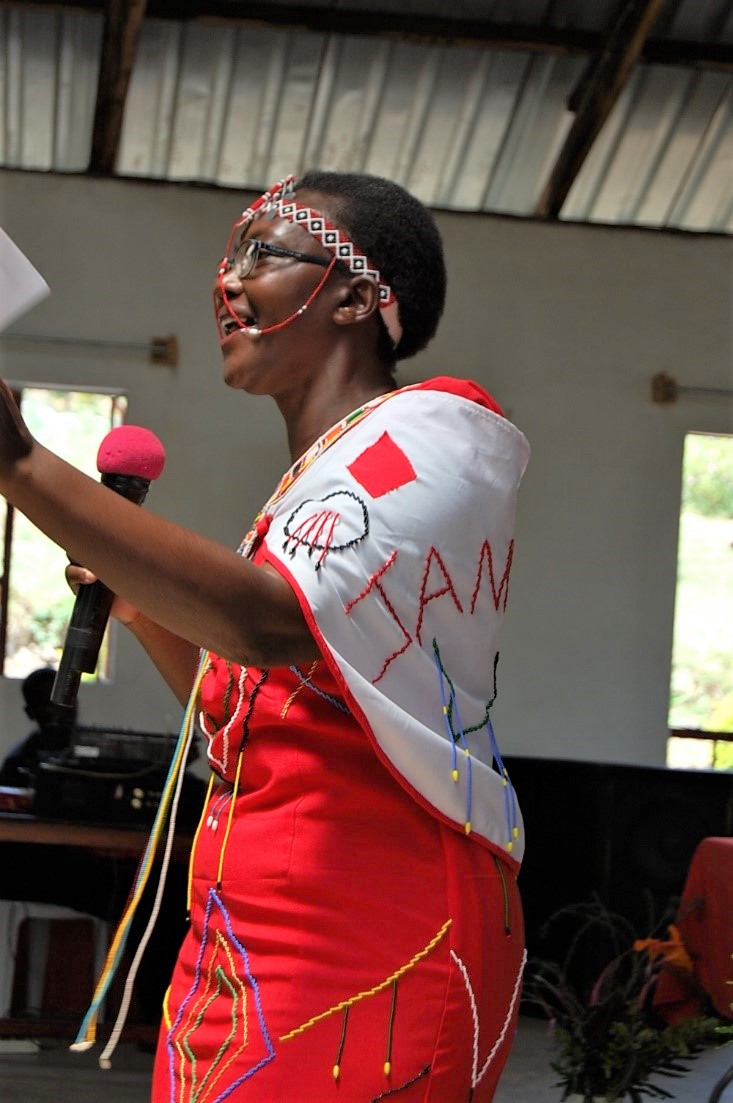 School founder Dr. Teresa Wasonga speaking to students at JAMS