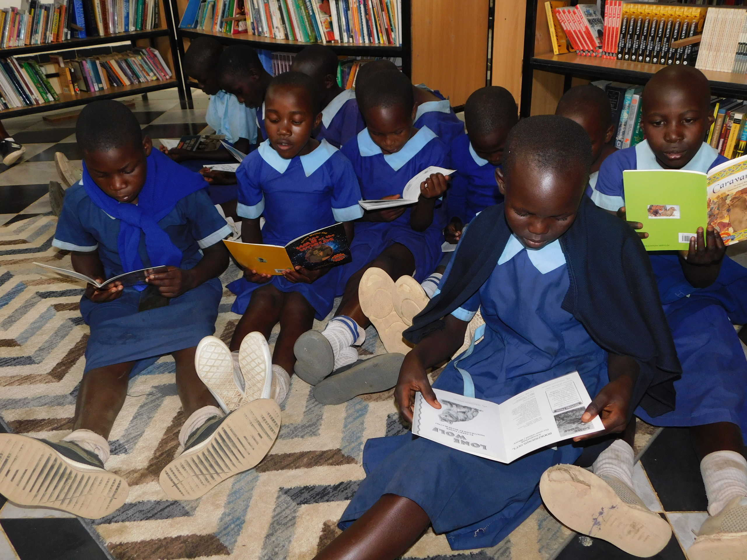 Local children reading in the Children's Library at JAMS