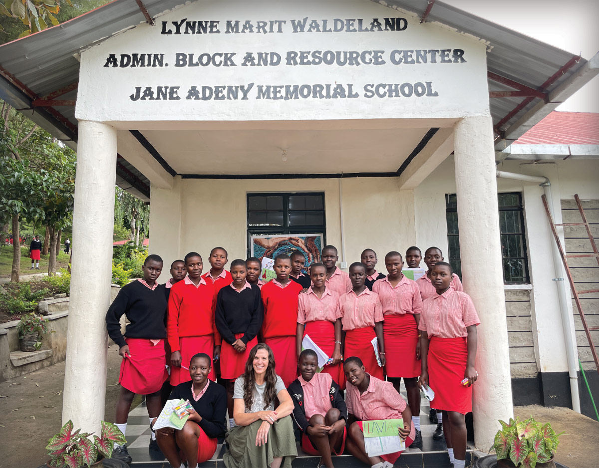 Librarian Andrea Trudeau and students at the Waldeland Center