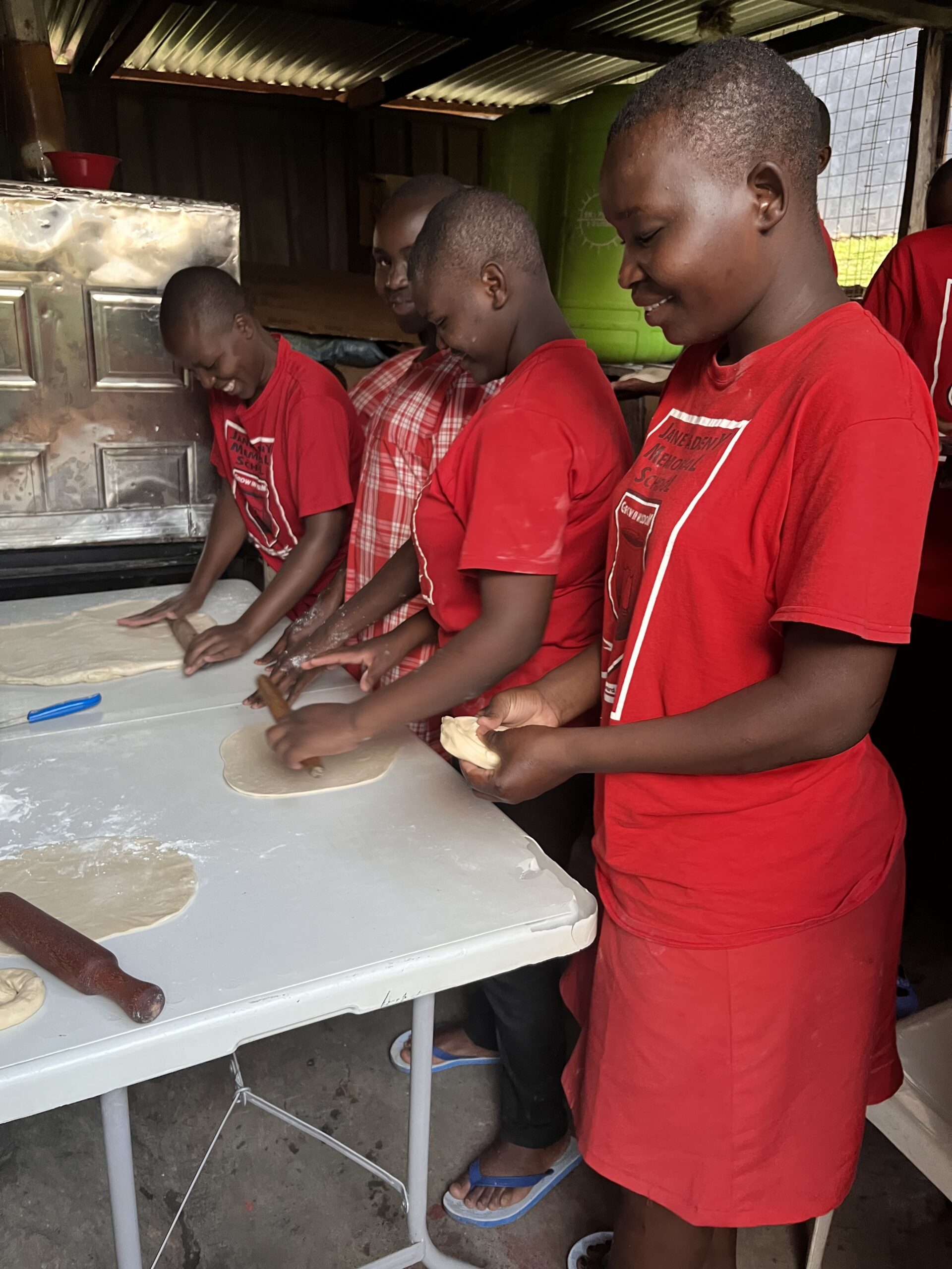 Students in Bakery Baking their own bread at JAMS reduces costs and provides extra income for the school.